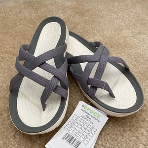 Brand new crocs flip flops